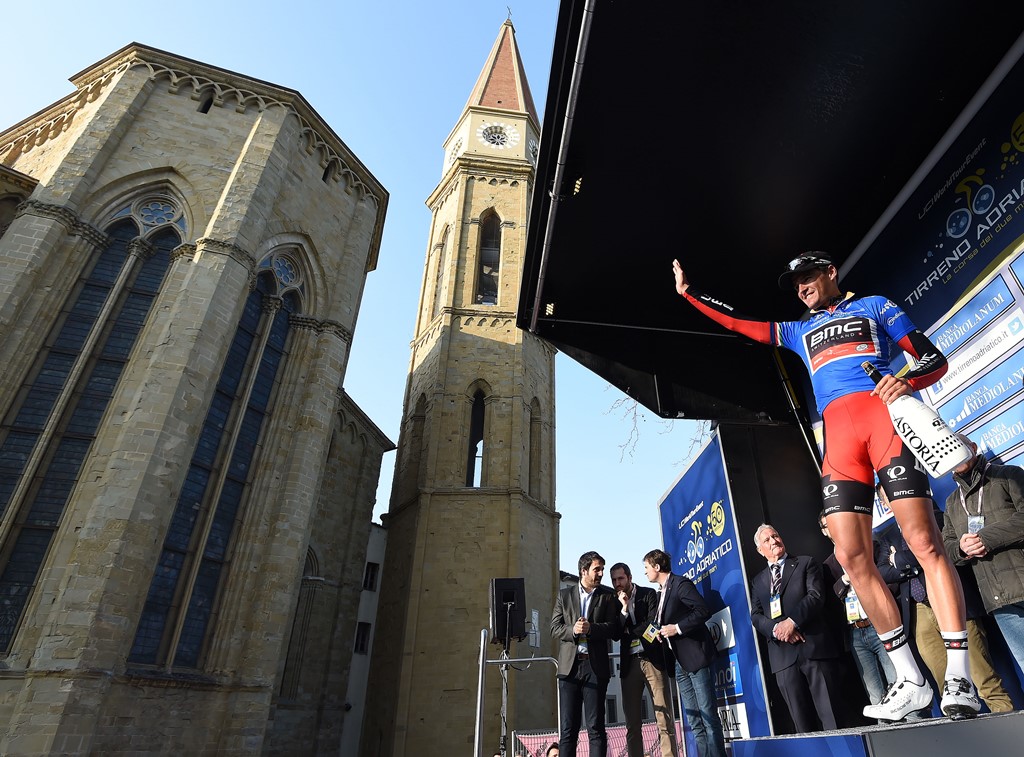 Il ciclista del BMC Racing Team Greg Van Avermaet feseteggia sul podio la vittoria nella  terza tappa Tirreno-Adriatico da Cascina ad Arezzo, 13 del marzo 2015. ANSA/DANIEL DAL ZENNARO
