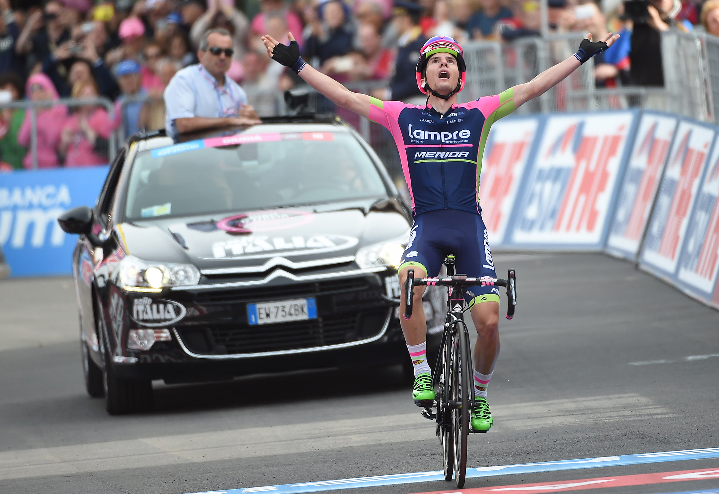 Slovenian rider  Jan Polanc of the  Lampre-Merida celebrate as he crosses the finish line to win the fifth stage of the 98th Giro d'Italia cycling tour over 152km from La Spezia to Abetone, Italy, 13 May 2015. ANSA/DANIEL DAL ZENNARO