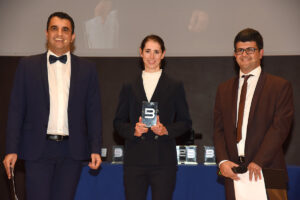 Marta Cavalli premiata da Valerio Villa e Giorgio Torre in occasione dei BICITV Awards 2022